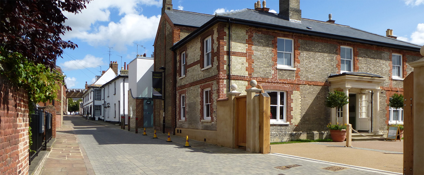 Travel to Trainers House entrance on Palace Street at the National Horseracing Museum