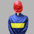 Thumbnail of Fred Astaire's racing silks - he chose dark blue with a yellow sash and red cap