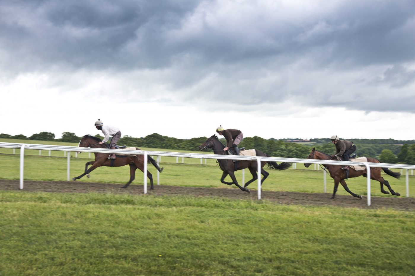 Race horses being exercised in and around Newmarket, Suffolk