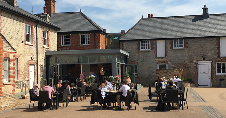 Tack Room restaurant and outside seating area at the National Horseracing Museum